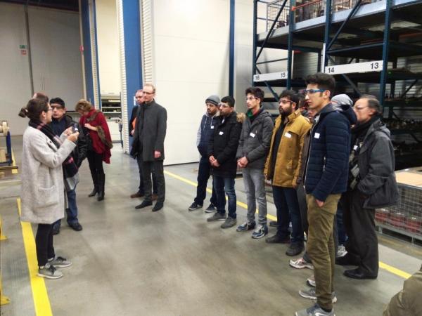 Vluchtelingen op bedrijfsbezoek in Tielt