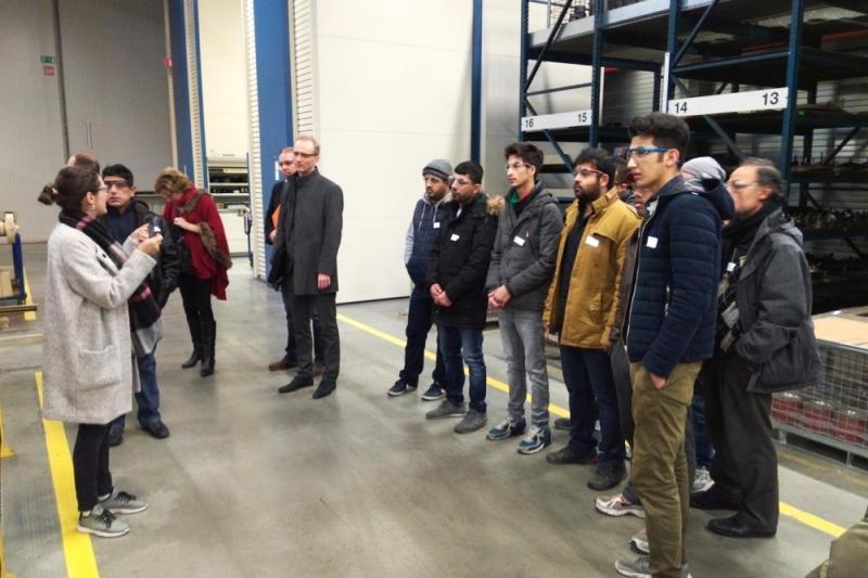 Vluchtelingen op bedrijfsbezoek in Tielt